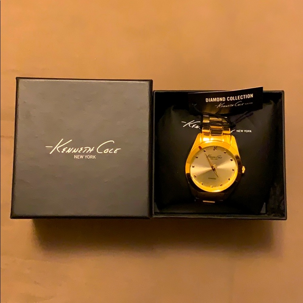 Gold Kenneth Cole watch with box and 2 extra links